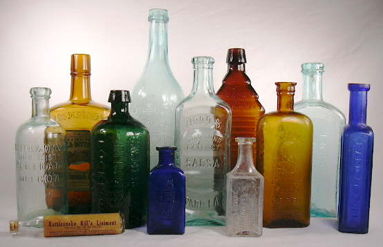 Grouping of medicinal bottles dating from the 1860s to 1920s; click to enlarge.