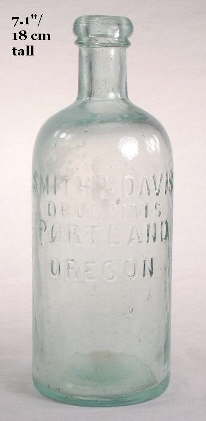 Round druggist bottle from the 1870s; click to enlarge.