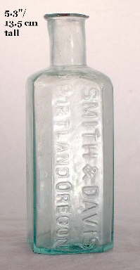 Early 1855-1865 square druggist bottle; click to enlarge.