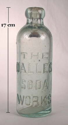 Hutchinson soda bottle with heavy embossing; click to enlarge.