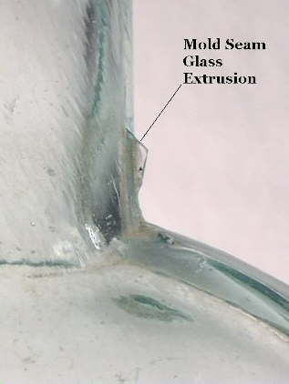 Image of a mold seam glass extrusion; click to enlarge.