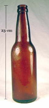 Early machine-made beer bottle in medium amber color; click to enlarge.