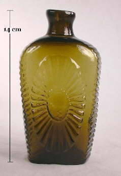 Early American sunburst flask in olive amber color; click to enlarge.