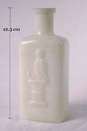 Milk glass Owl Drug Company bottle; click to enlarge.