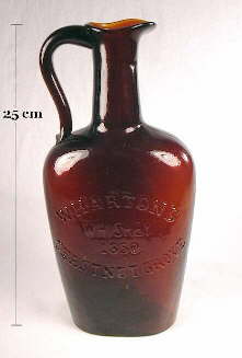 Wharton's Whiskey jug in a reddish amber color; click to enlarge.