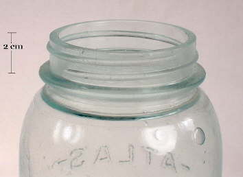 Image of a wide mouth external thread finish on an early 20th century fruit jar; click to enlarge.