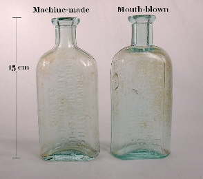 A pair of Groves Chill Tonic bottles with different manufacturing histories; click to enlarge.