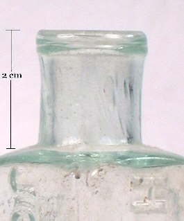 Image of a straight (rolled) finish on an 1850's hair dye bottle; click to enlarge.