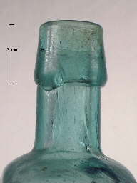 Image of an oil finish on an 1870's patent medicine bottle; click to enlarge.