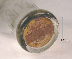 Image of a cap in a capseat finish on a milk bottle; click to enlarge.