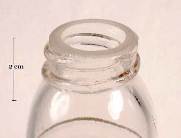 Image of a late 19th century liquor flask with a ground external screw thread finish; click to enlarge.