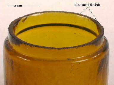 Image of a late 19th century ointment jar with a ground finish; click to enlarge.