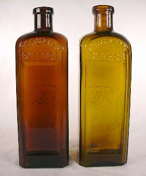 Two Peruvian Bitters blown in the same mold with different finishes types; click to enlarge.