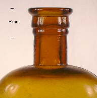 Image of a reinforced extract finish on a late 19th century patent medicine bottle; click to enlarge.