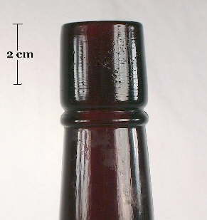Image of a straight brandy finish on an early 20th century liquor bottle; click to enlarge.