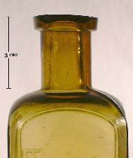 Image of a prescription finish on a late 19th century patent medicine bottle; click to enlarge.