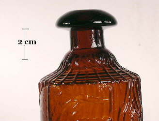 Image of a late 19th Tippecanoe bottle with it's unique finish; click to enlarge.