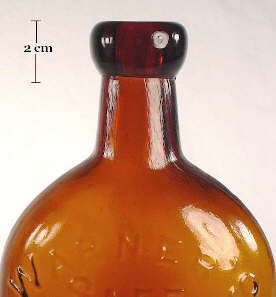 Image of a blob style finish on a late 19th century patent medicine bottle; click to enlarge.