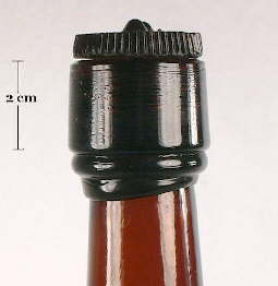 Image of a mid 19th century liquor bottle with an inside thread finish and glass threaded stopper; click to enlarge.