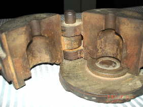 Cup base mold from the late 19th century; click to enlarge.