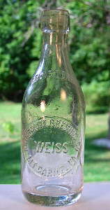 Early 20th century weiss beer bottle; click to enlarge.