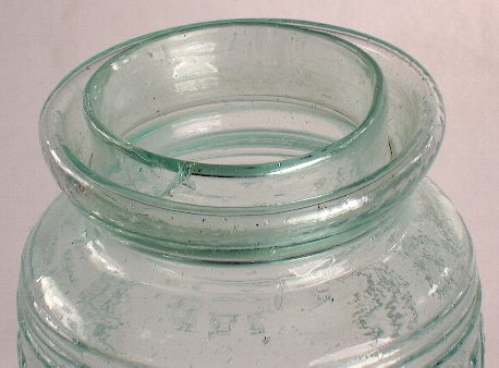 Close-up of the Air-Tight jar groove ring wax seal finish.