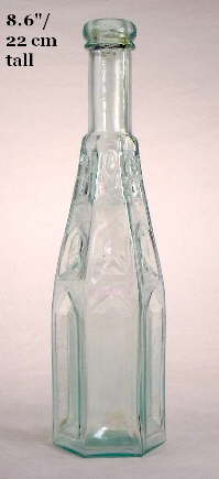 Mid-19th century hexagonal gothic peppersauce bottles; click to enlarge.