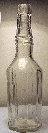 Late 19th century fluted pepper sauce bottle; click to enlarge.