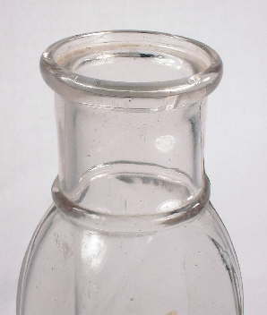 Early 20th century pickle bottle with capseat accepting finish; click to enlarge.