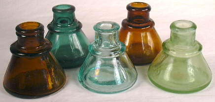 Group of mouth-blown cone ink bottles from about 1900.