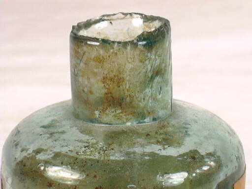 Burst-off finish on an English ink bottle; click to enlarge.