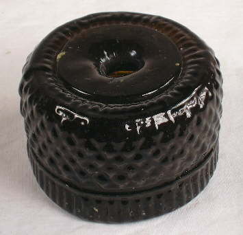 Top view a ca. 1830s inkwell.