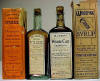 Two labeled patent medicine bottles; click to enlarge.