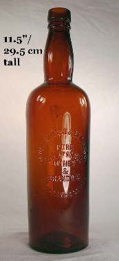 Early 20th century brandy bottle; click to enlarge.