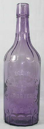 Early 20th century liquor bottle with fluted shoulders; click to enlarge.