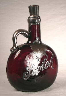 Late 19th century handled scotch decanter.