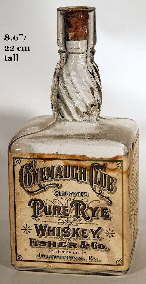 Early 20th century square liquor with swirled neck; click to enlarge.
