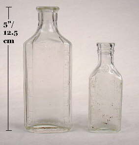 Machine-made druggist bottles; click to enlarge.