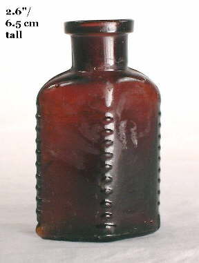 Early 20th century poison mouth-blown poison bottle; click to enlarge.