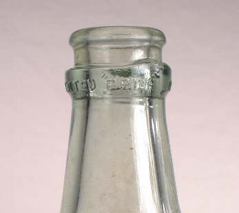 "Priof" finish on a Citrate of Magnesia bottle; click to enlarge.