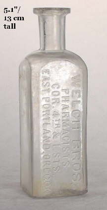Square 1880s druggist bottle; click to enlarge.