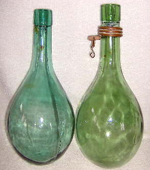 Early to mid-20th century chianti wine bottles; click to enlarge.