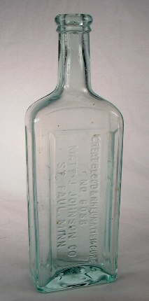 Medicine bottle with mold vent markings.  Click to view illustration of same bottle showing location of small vent marks.