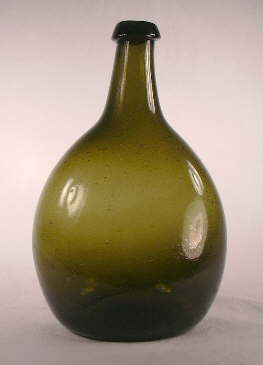 Front view of a New England chesnut flask from the early 19th century.