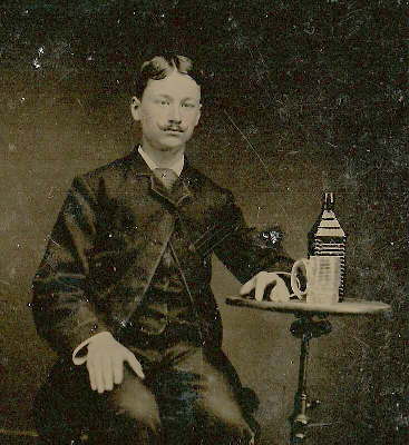 Tintype of a man and his Drake's Plantation Bitters - ca. 1865-1875.