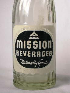 Applied color label on a 1946 soda water bottle from Oregon.