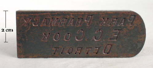 A plate mold plate for a druggist bottle from the early 20th century.